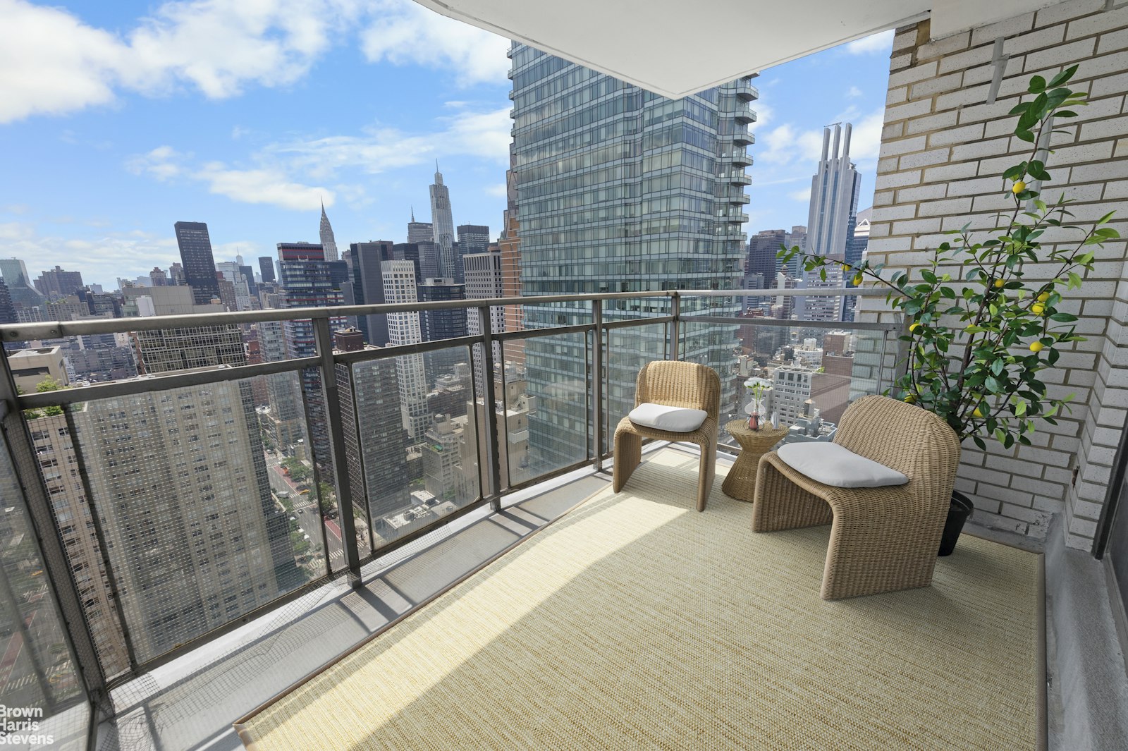 303 East 57th Street, Unit 39A Manhattan, NY 10022 - Photo 12 of 16 a view of balcony with furniture