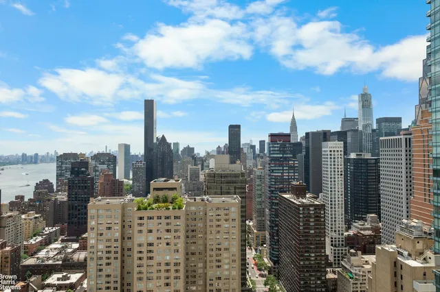 a view of balcony with furniture