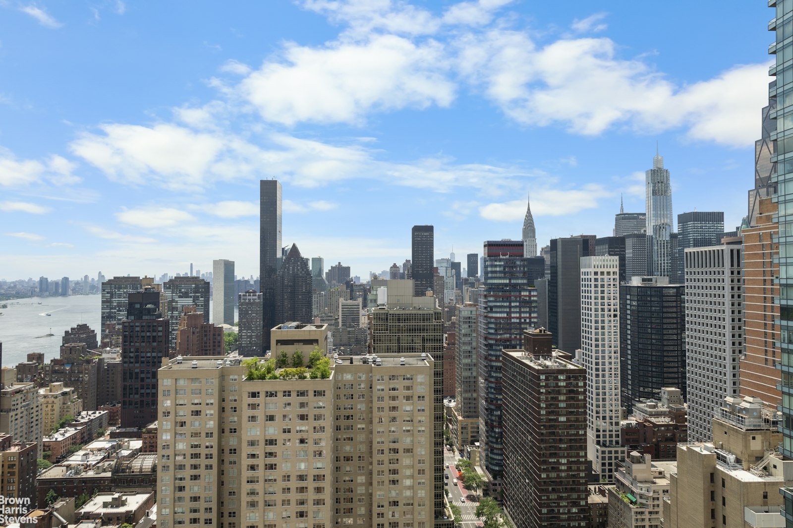 303 East 57th Street, Unit 39A Manhattan, NY 10022 - Photo 13 of 16 a view of a city with tall buildings