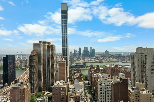 a view of a city with tall buildings