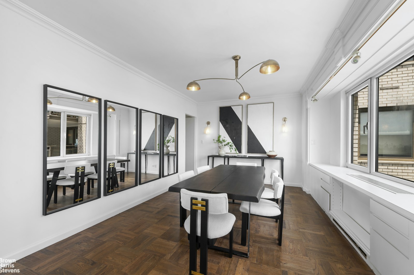 303 East 57th Street, Unit 39A Manhattan, NY 10022 - Photo 4 of 16 a living room with furniture and a large window