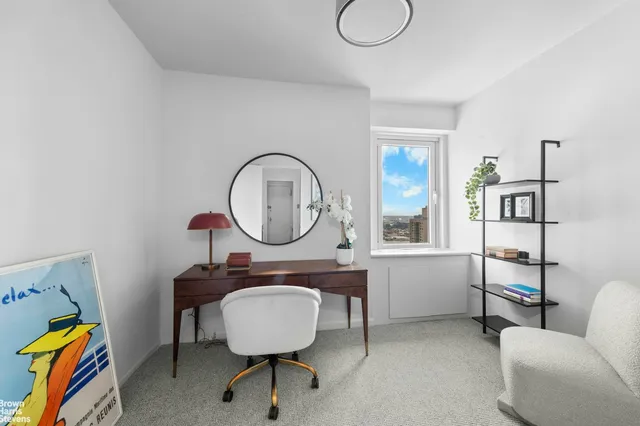 a kitchen with granite countertop a sink a stove and a microwave