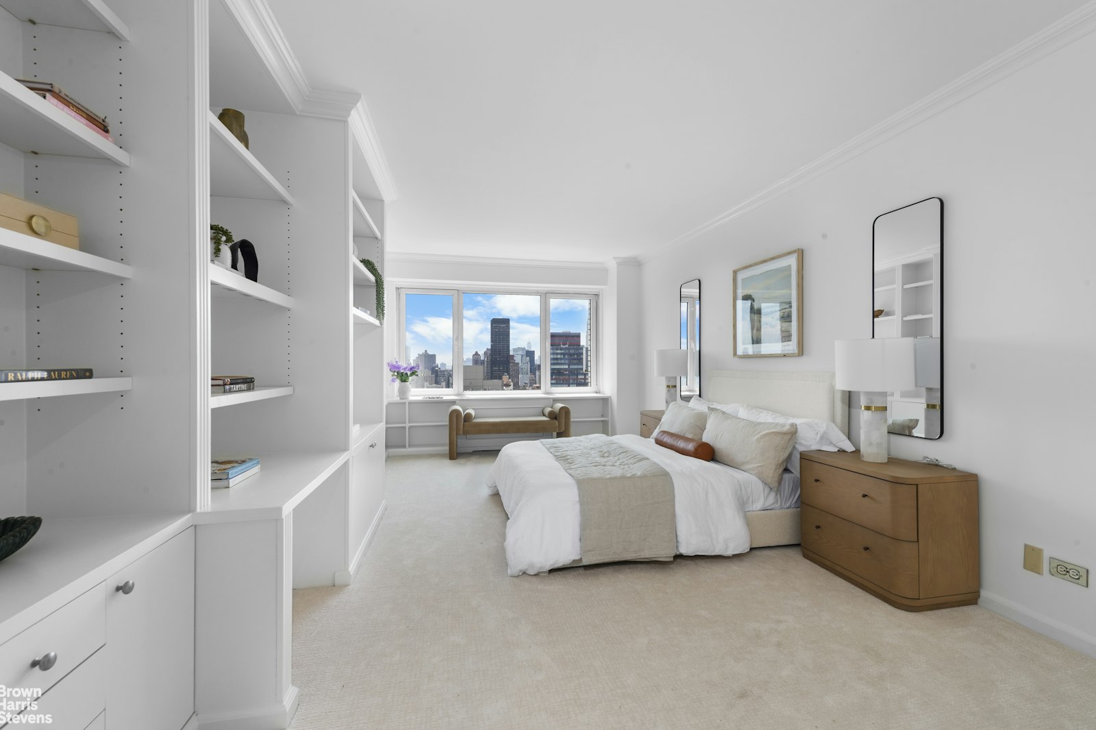 303 East 57th Street, Unit 39A Manhattan, NY 10022 - Photo 8 of 16 a bed room with bed and a large window