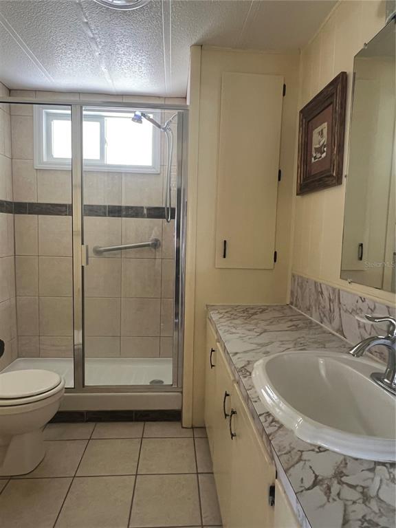 1100 South Belcher Road, Unit 185 Largo, FL 33771 - Photo 11 of 50 a bathroom with a sink toilet and shower