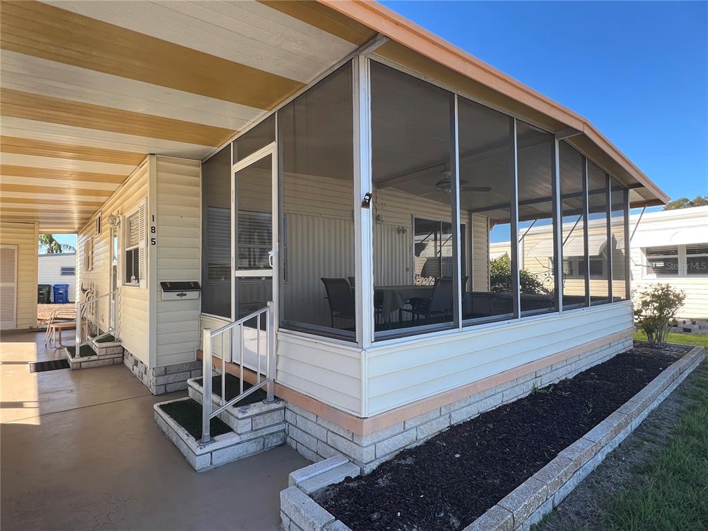 1100 South Belcher Road, Unit 185 Largo, FL 33771 - Photo 2 of 50 a view of lobby with glass door