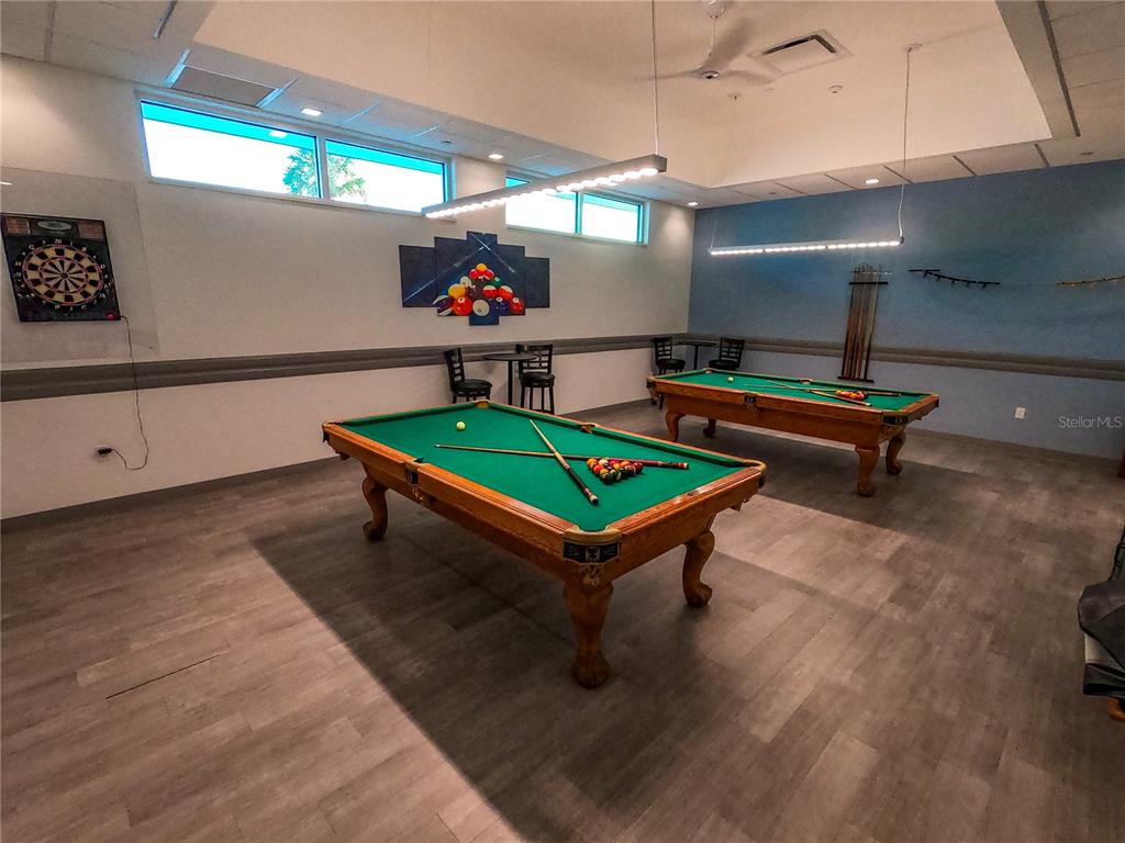 1100 South Belcher Road, Unit 185 Largo, FL 33771 - Photo 23 of 50 a room with pool tables and windows