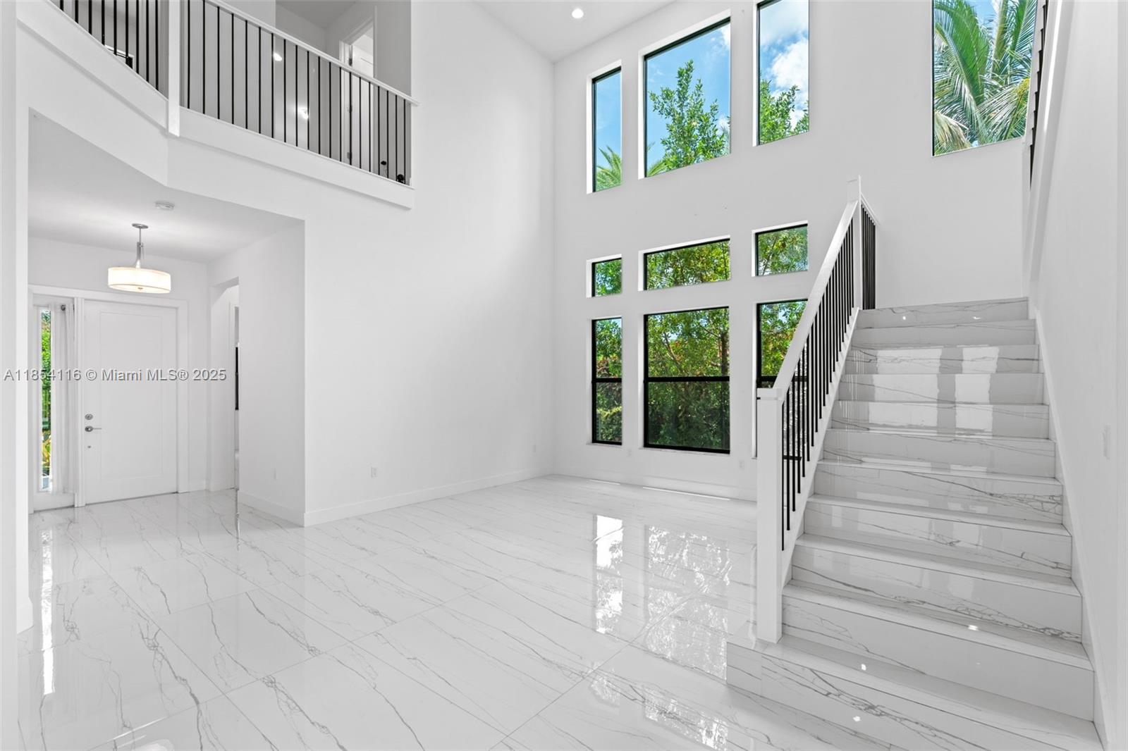 17117 Teton River Road Boca Raton, FL 33496 - Photo 46 of 77 a view of front door with stairs