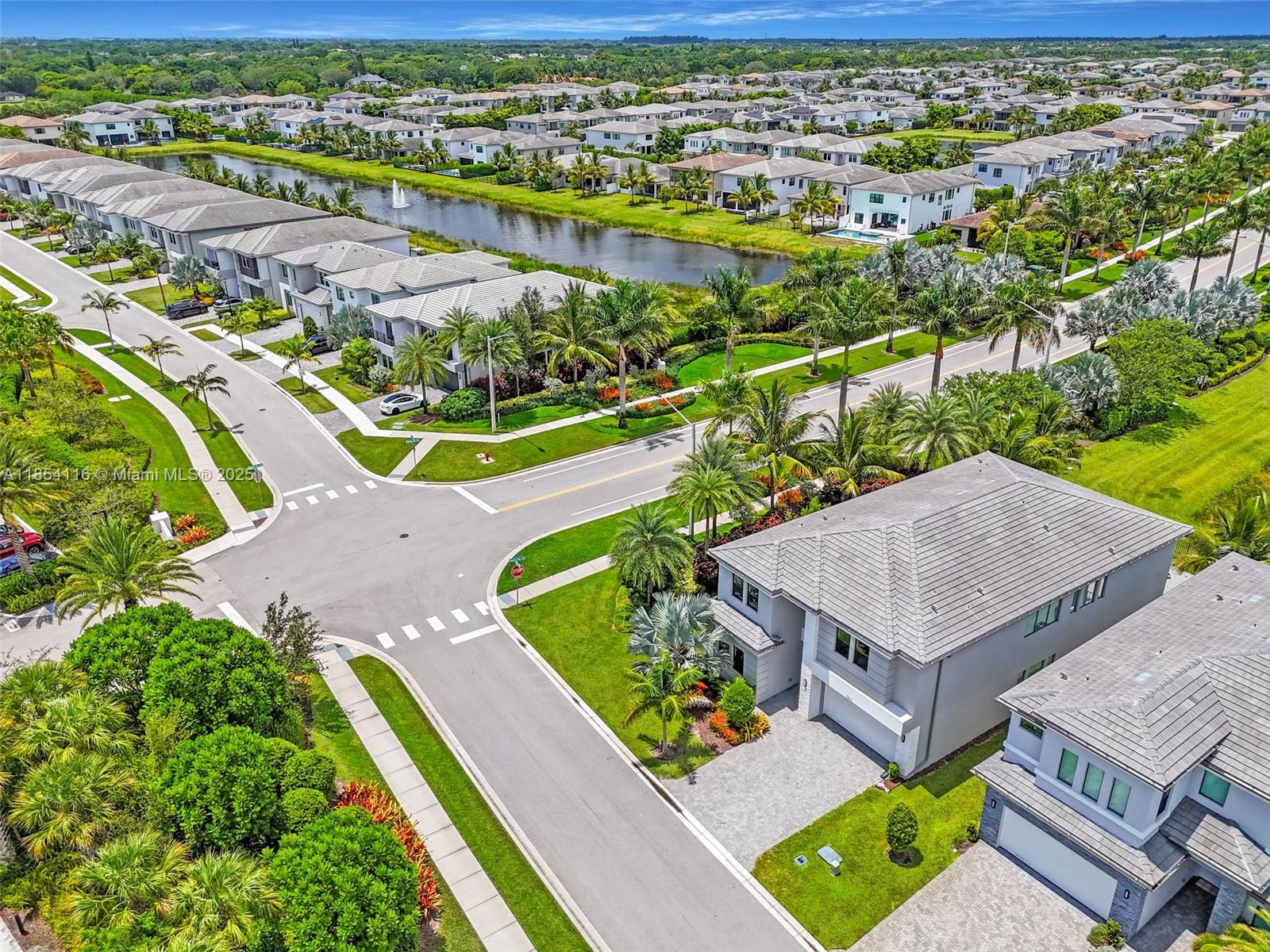 17117 Teton River Road Boca Raton, FL 33496 - Photo 69 of 77 an aerial view of residential houses with outdoor space and river