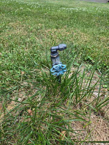 a bathroom with a toilet and a sink