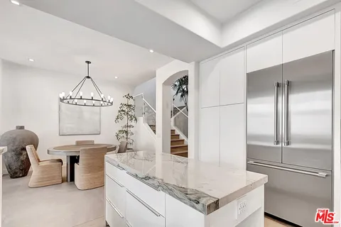 a very nice looking room with a chandelier