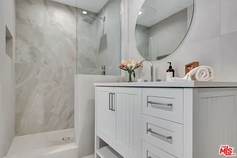 a living room with furniture and a gate