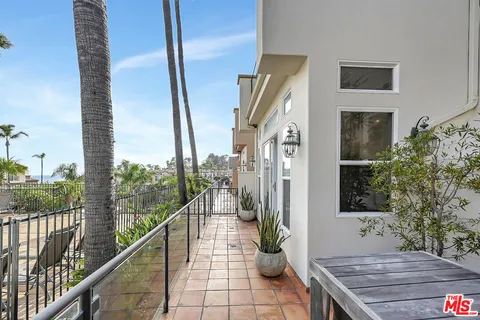 a view of a lake with a building in the background