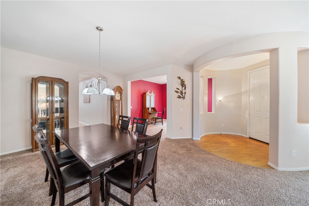 28713 Raintree Drive Menifee, CA 92584 - Photo 11 of 56 a view of a dining room with furniture