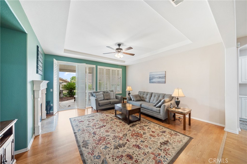 28713 Raintree Drive Menifee, CA 92584 - Photo 14 of 56 a living room with furniture and a rug