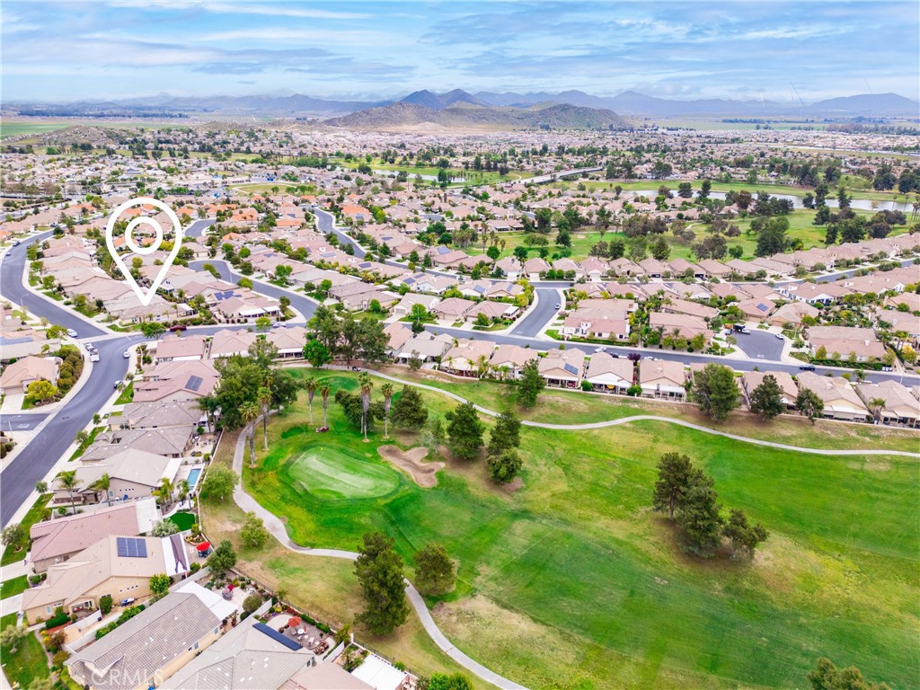 28713 Raintree Drive Menifee, CA 92584 - Photo 39 of 56 an aerial view of residential houses with outdoor space
