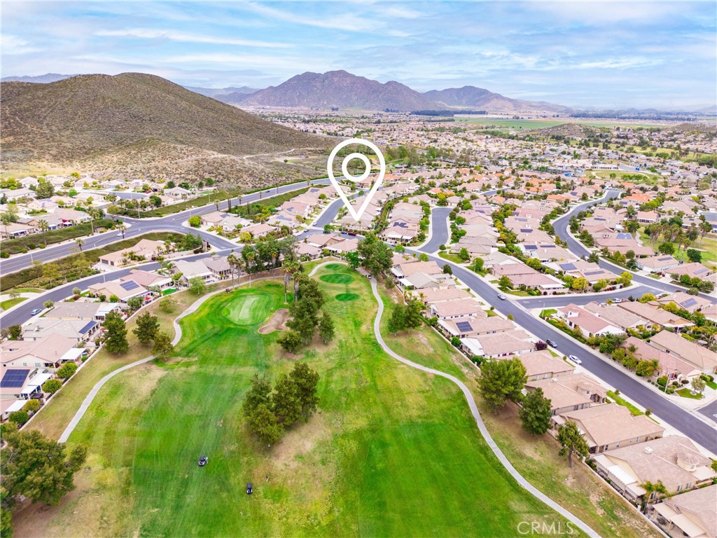 28713 Raintree Drive Menifee, CA 92584 - Photo 40 of 56 an aerial view of residential houses with outdoor space