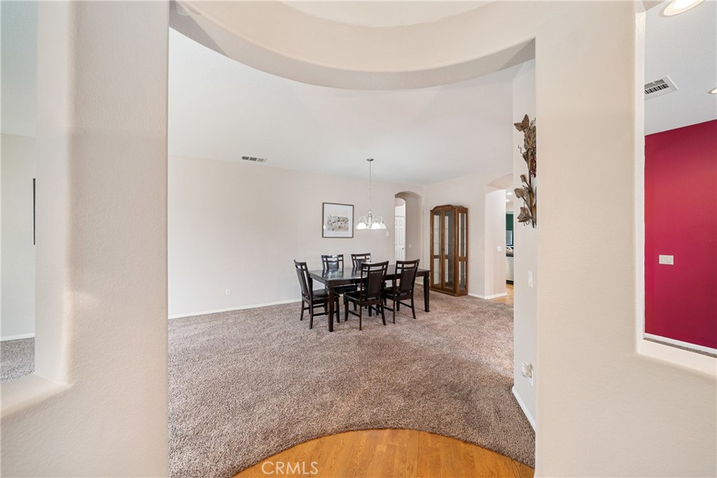 28713 Raintree Drive Menifee, CA 92584 - Photo 5 of 56 a view of dining room with furniture and front door
