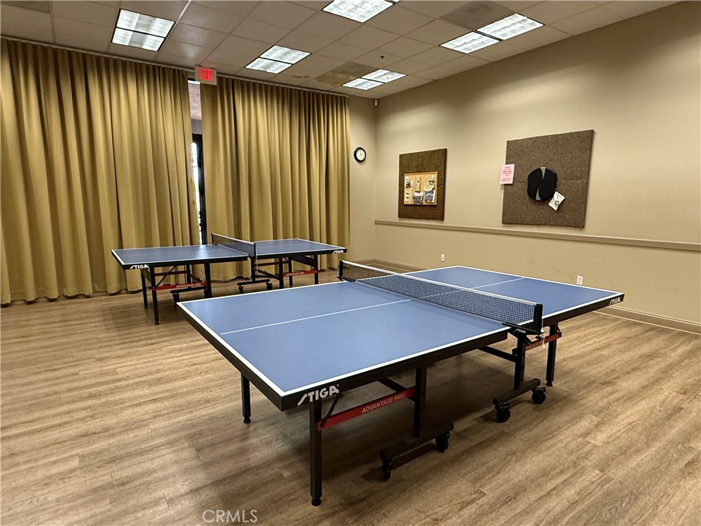 28713 Raintree Drive Menifee, CA 92584 - Photo 52 of 56 a view of a room with furniture and wooden floor