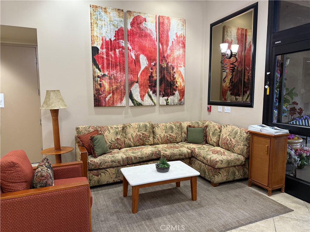 28713 Raintree Drive Menifee, CA 92584 - Photo 53 of 56 a living room with furniture and painting on the wall