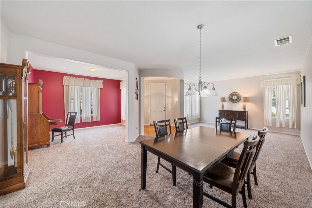 28713 Raintree Drive Menifee, CA 92584 - Photo 6 of 56 a dining room with furniture and window