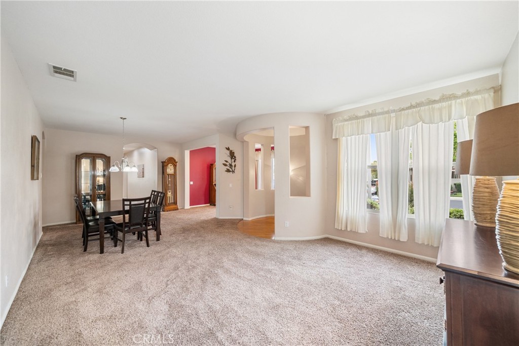 28713 Raintree Drive Menifee, CA 92584 - Photo 10 of 56 a view of a livingroom with furniture and furniture
