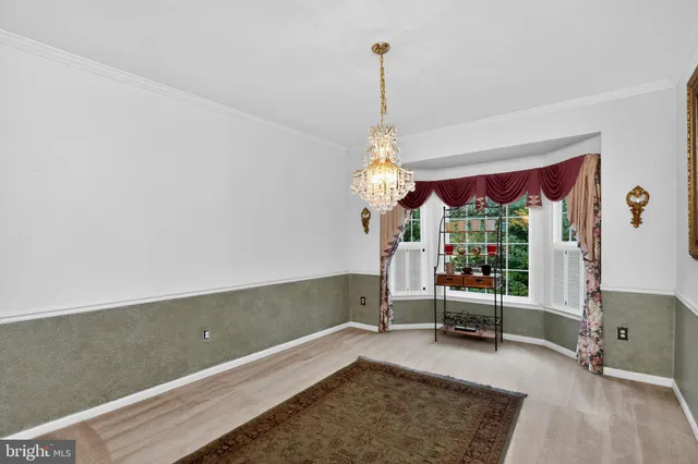 a bathroom with a sink mirror toilet and bathtub