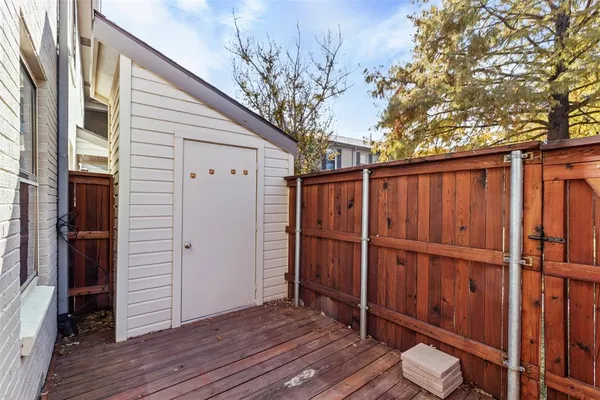 a view of a wooden fence