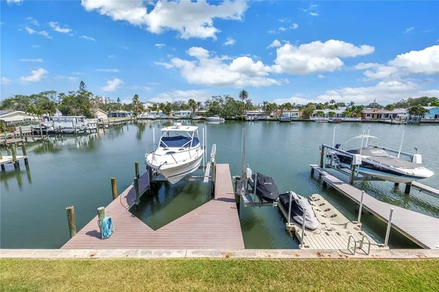 $995,000 | 100 Windrush Boulevard, Unit 1, Indian Rocks Beach, FL 33785