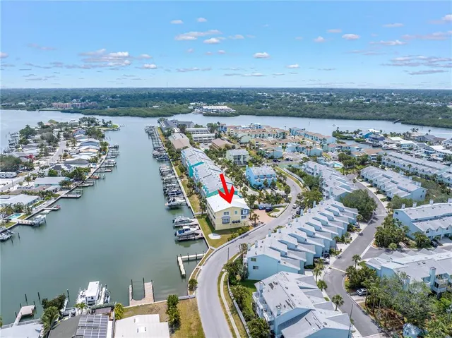 $995,000 | 100 Windrush Boulevard, Unit 1, Indian Rocks Beach, FL 33785