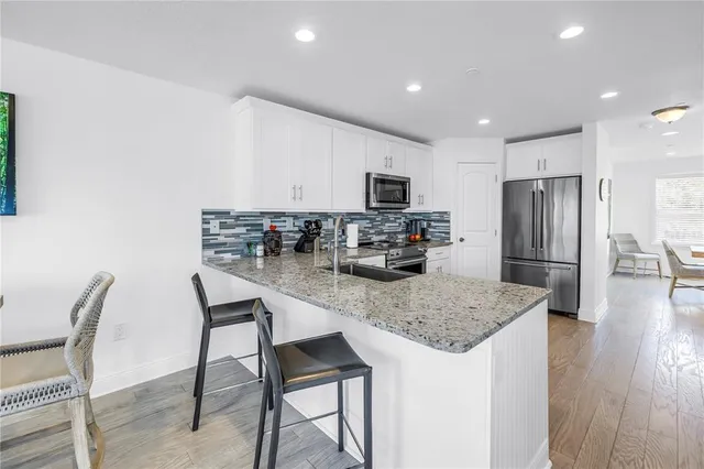 $995,000 | 100 Windrush Boulevard, Unit 1, Indian Rocks Beach, FL 33785