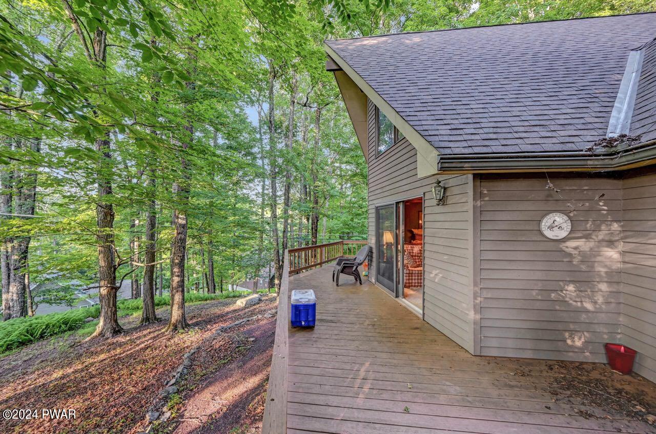 110 Valley Run Road Greentown, PA 18426 - Photo 63 of 67 a view of a patio with table and chairs with wooden floor and fence