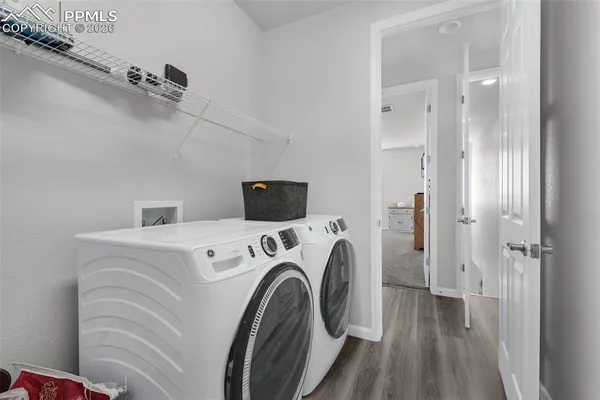 a utility room with dryer and washer