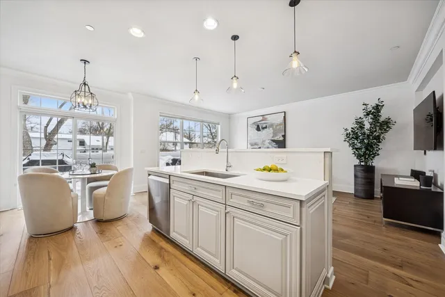 a kitchen that has a lot of cabinets in it