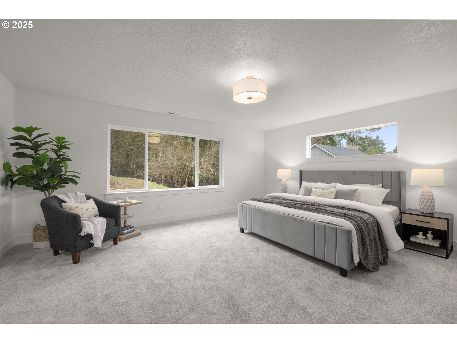 19040 Southwest Northridge Court, Unit LOT 15 Beaverton, OR 97007 - Photo 19 of 34 a spacious bedroom with a bed and a couch