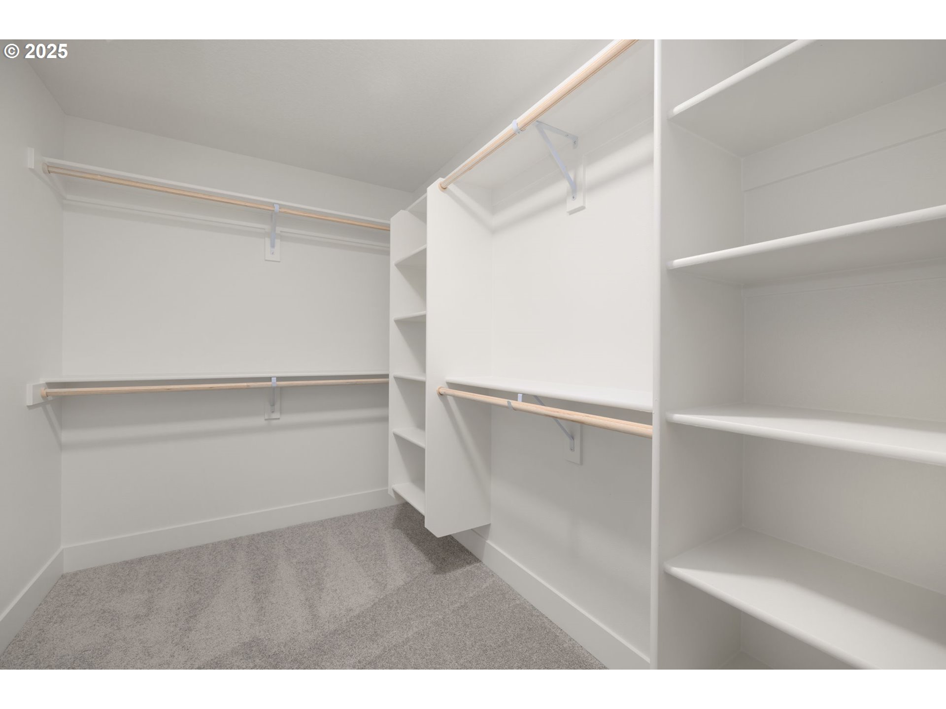 19040 Southwest Northridge Court, Unit LOT 15 Beaverton, OR 97007 - Photo 26 of 34 a view of an empty walk in closet