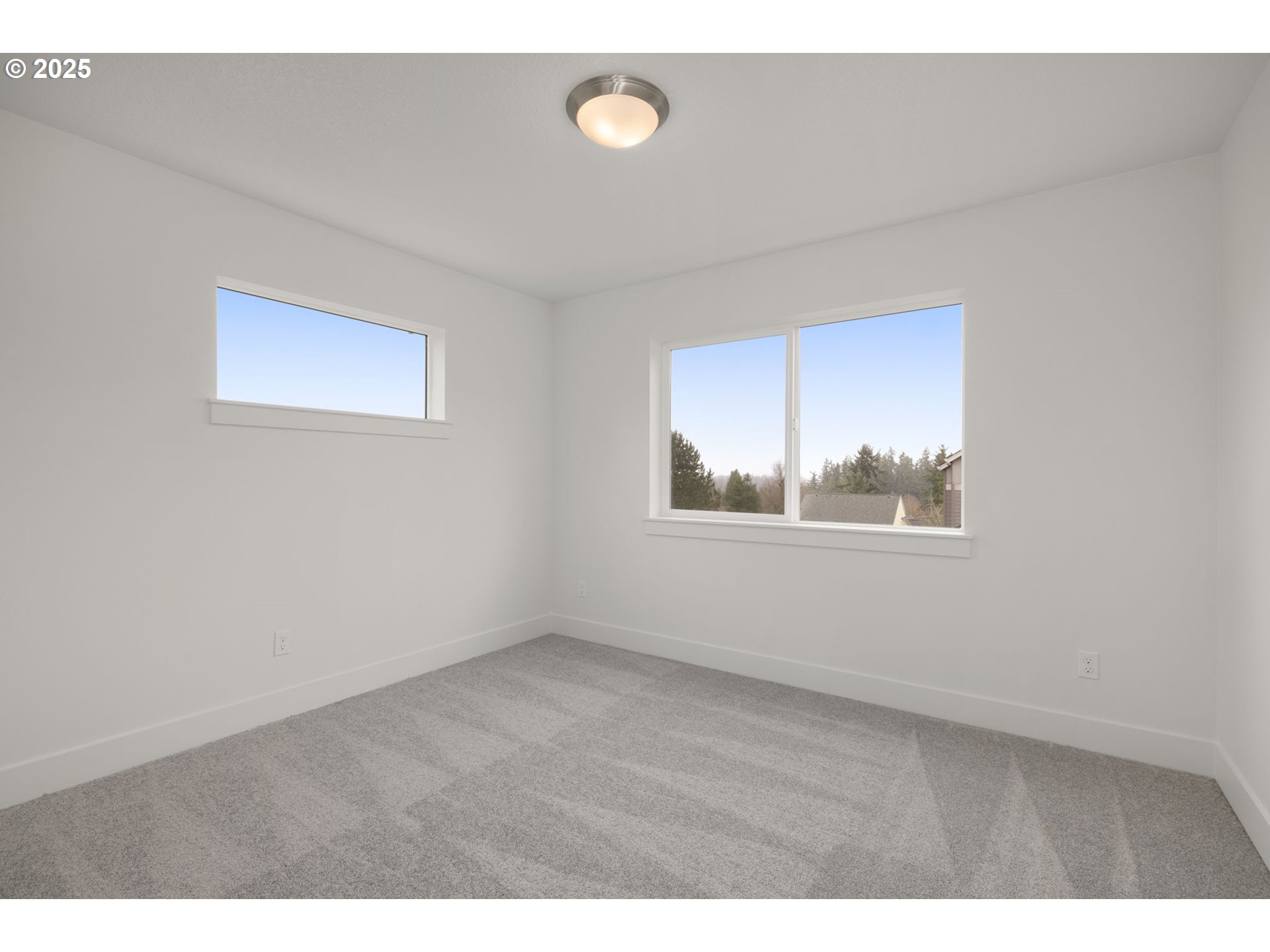 19040 Southwest Northridge Court, Unit LOT 15 Beaverton, OR 97007 - Photo 27 of 34 a view of an empty room with a window