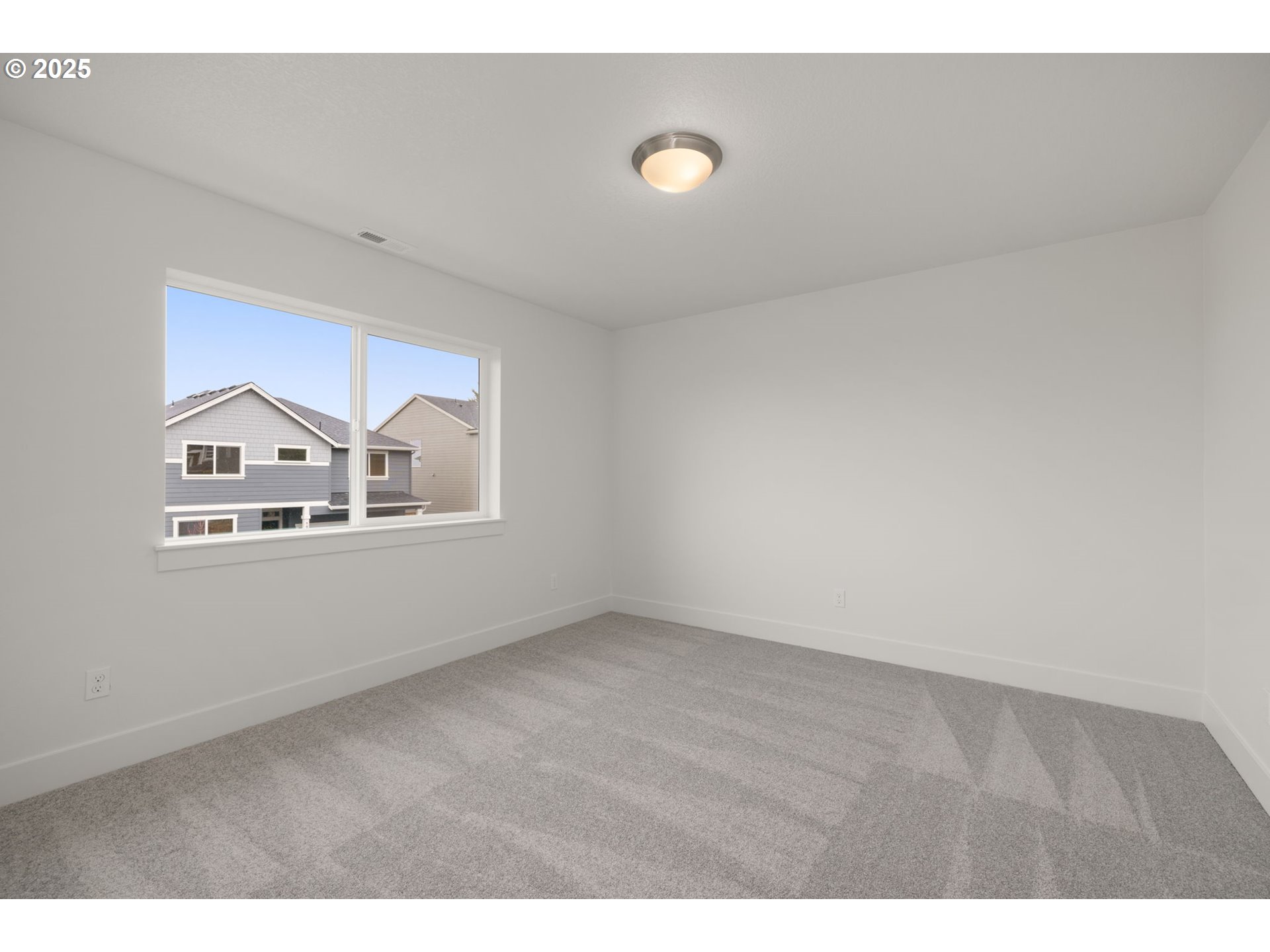 19040 Southwest Northridge Court, Unit LOT 15 Beaverton, OR 97007 - Photo 28 of 34 a view of empty room with window