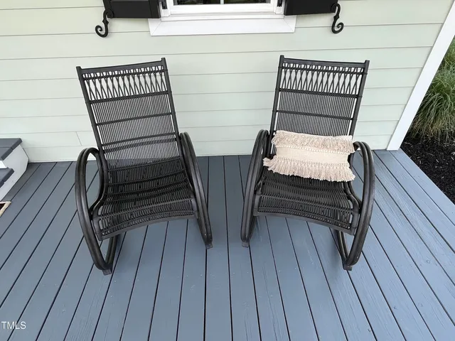 wooden floor in an empty room with a fireplace