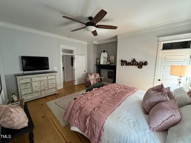 a view of a livingroom with wooden floor