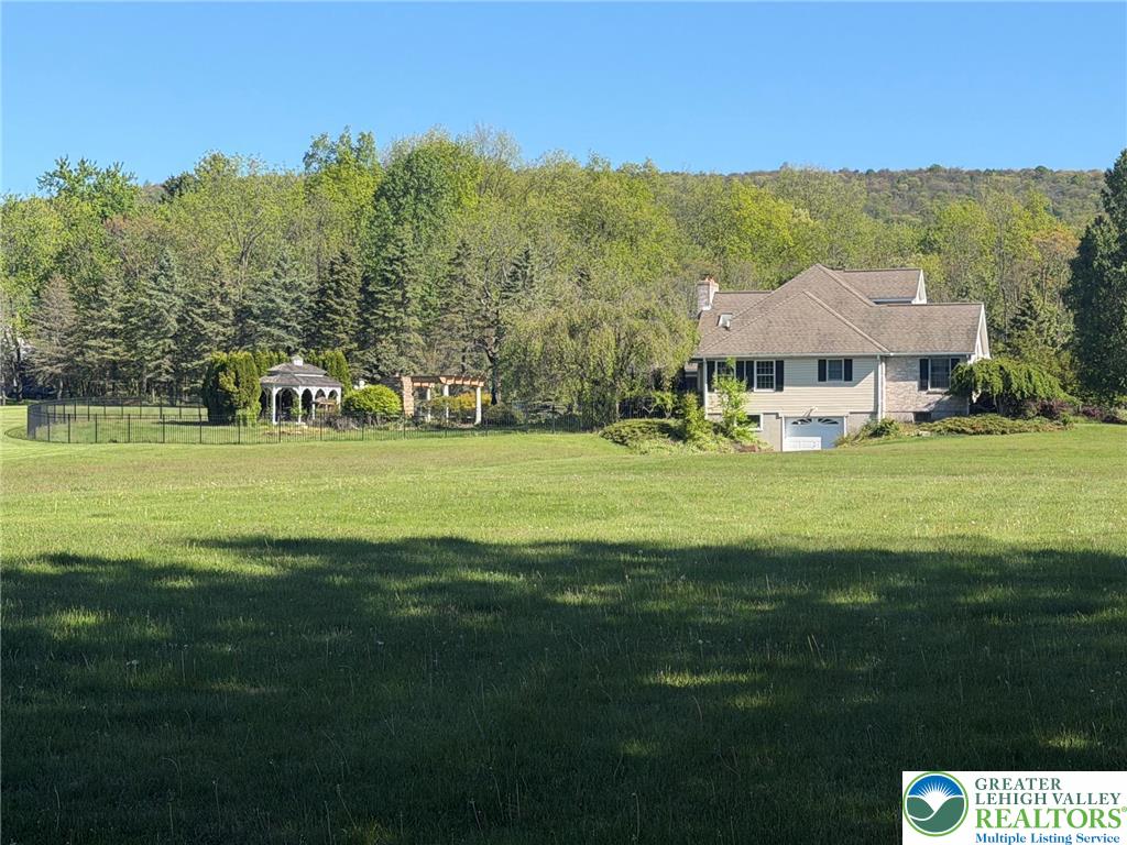 1089 Deemer Road Bath, PA 18014 - Photo 48 of 57 a front view of a house with garden
