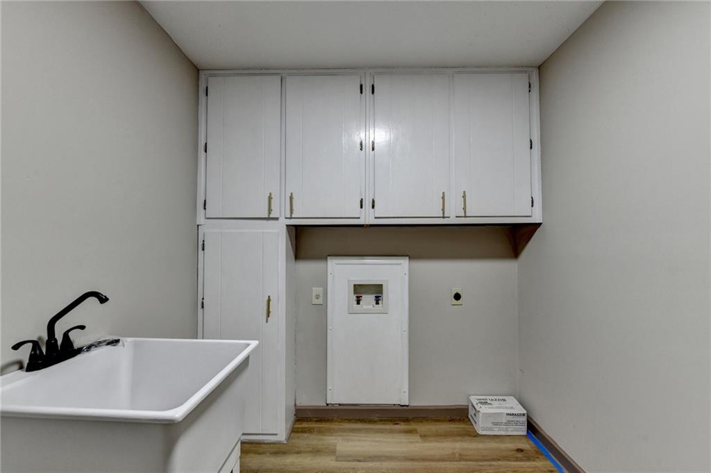 2377 Centerville Rosebud Road Loganville, GA 30052 - Photo 61 of 76 a bathroom with a sink and a mirror