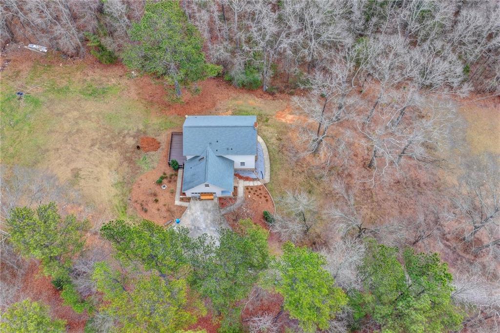2377 Centerville Rosebud Road Loganville, GA 30052 - Photo 69 of 76 an aerial view of a house with a yard