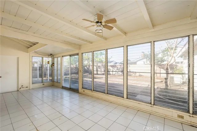 a view of a hallway with a chandelier
