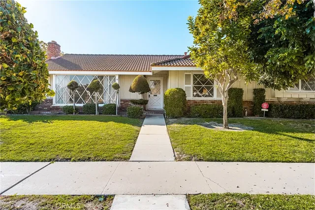 a front view of house with yard