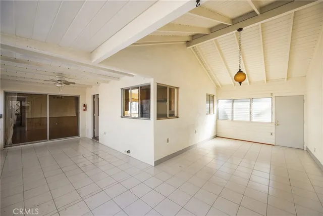 a view of a backyard of the house