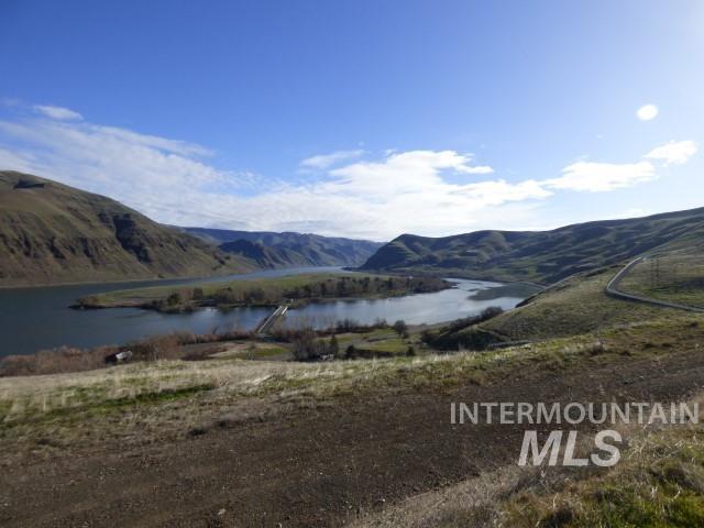 578 Silcott Road Clarkston, WA 99403 - Photo 30 of 47 View of mountain backdrop with a large body of water