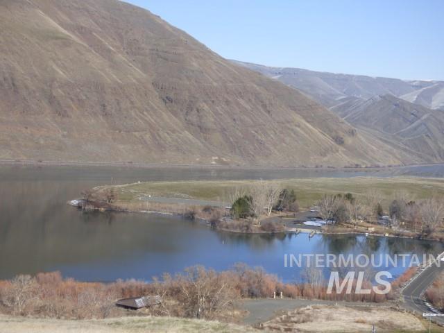 578 Silcott Road Clarkston, WA 99403 - Photo 45 of 47 View of mountain backdrop featuring a nearby body of water