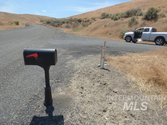 578 Silcott Road Clarkston, WA 99403 - Photo 47 of 47 View of asphalt road featuring a mountain view