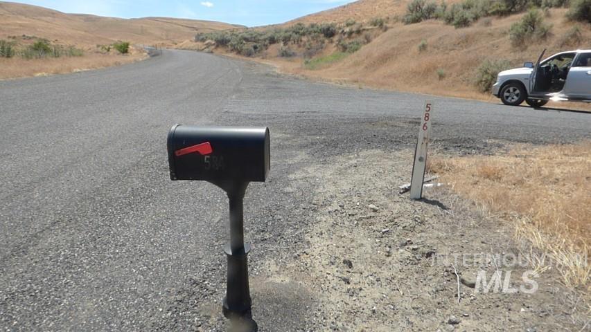 578 Silcott Road Clarkston, WA 99403 - Photo 6 of 47 View of asphalt road featuring a mountain view