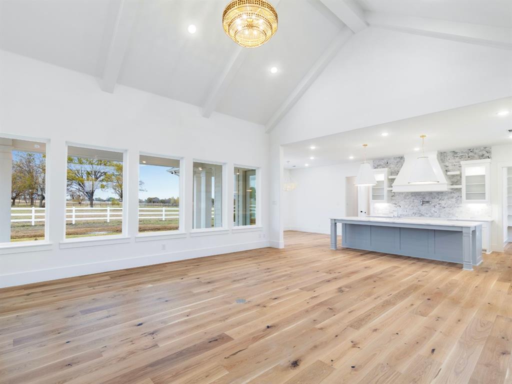 3 Pop Noah Road Collinsville, TX 76233 - Photo 15 of 17 a view of kitchen and window with wooden floor